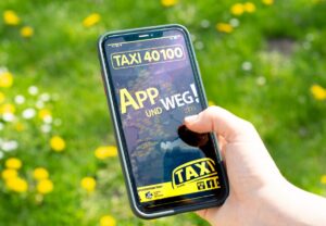 Taxi40100 App auf einen Handybildschirm